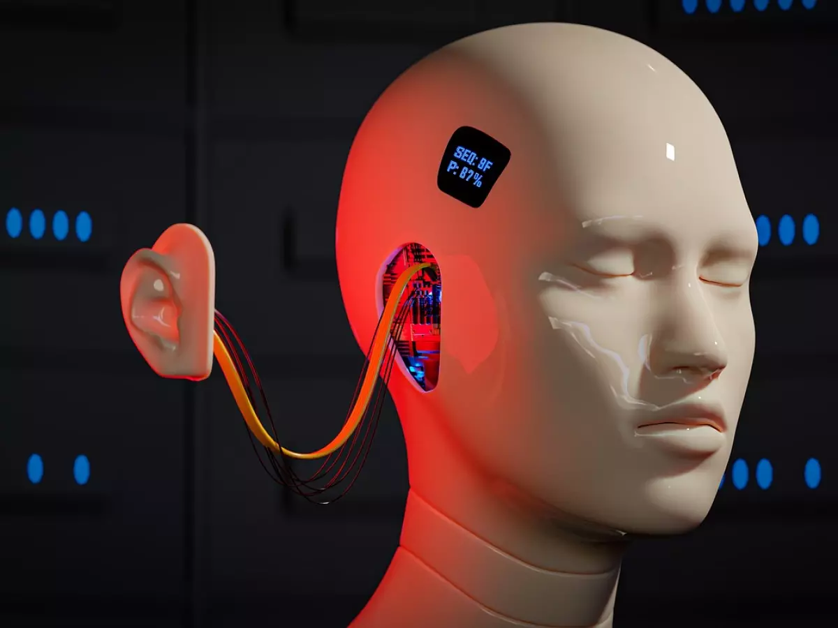 A close-up of a humanoid robot's head with exposed wiring and circuitry, highlighting its internal workings.