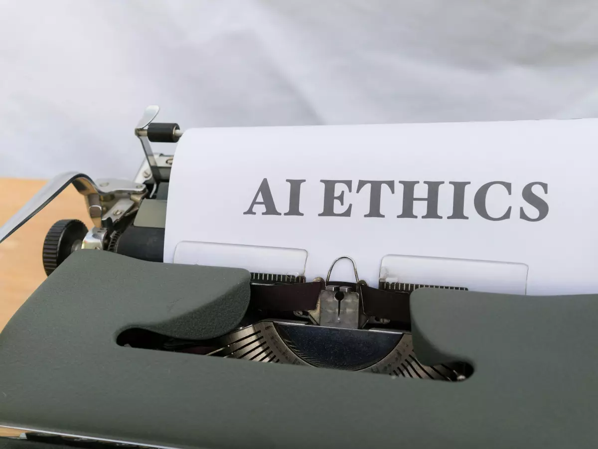 A vintage typewriter with a piece of paper that says "AI ETHICS"