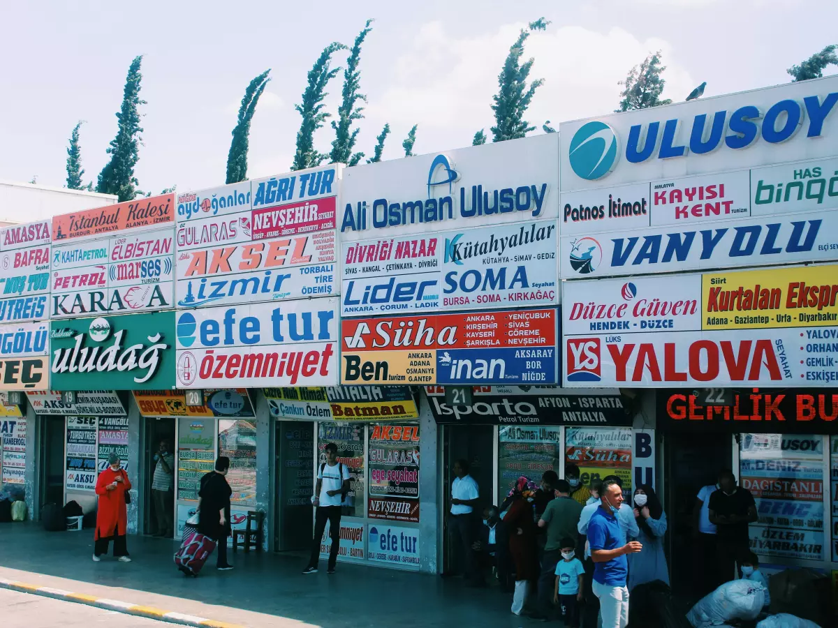 A building with multiple signs in different languages, representing the theme of business translations.