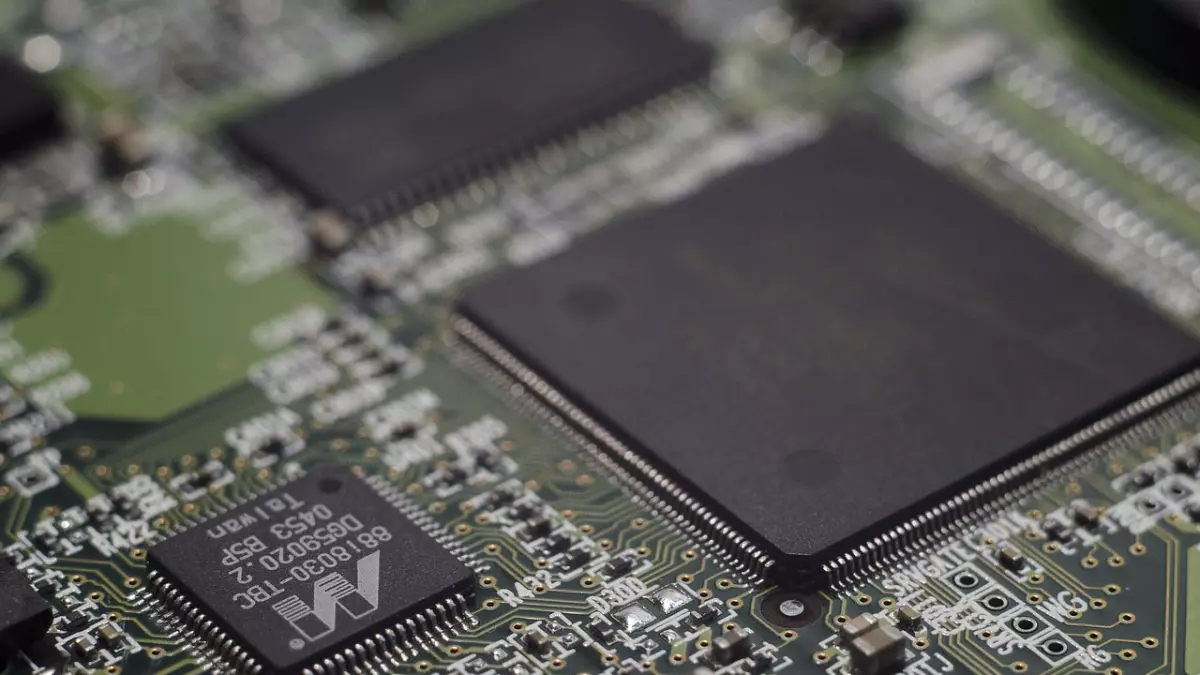 A close-up shot of a circuit board with a chipset in the center.