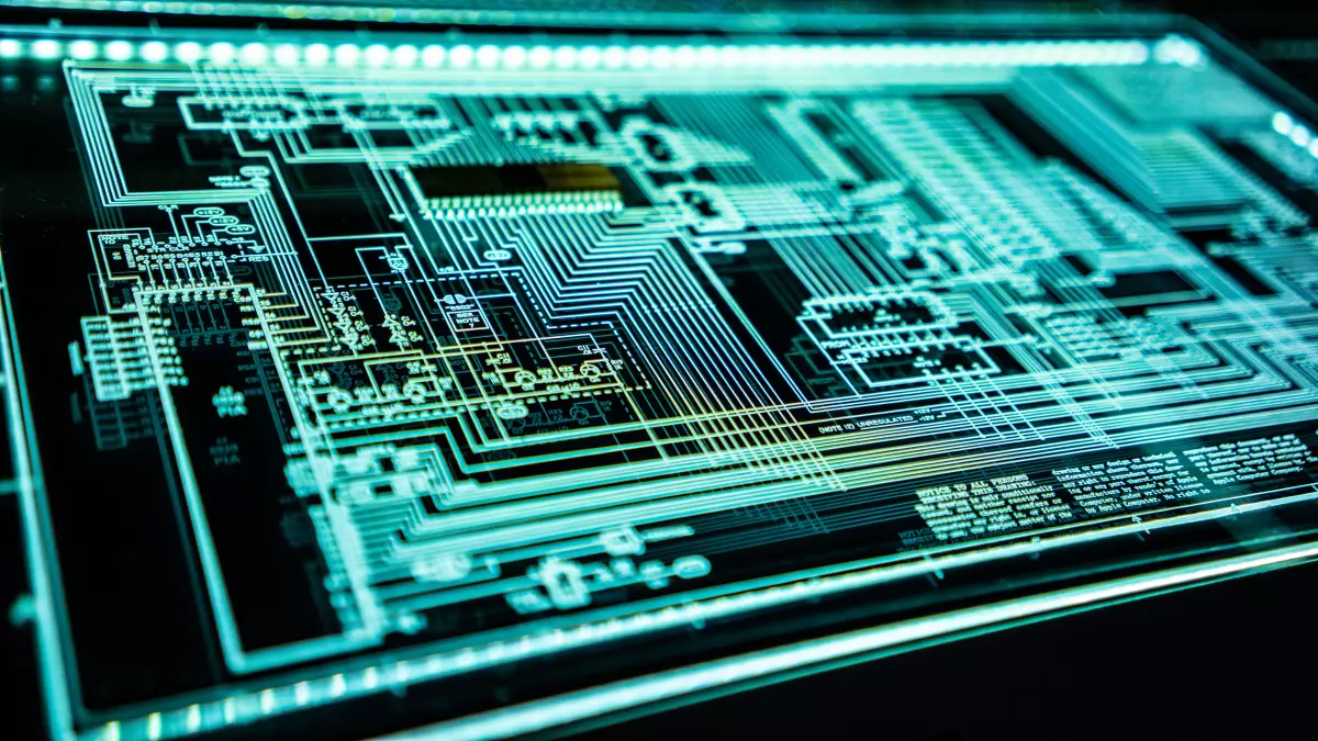 Close up shot of a circuit board, with green lines on a black background, a glass panel is over the circuit board, with lights along the edges.