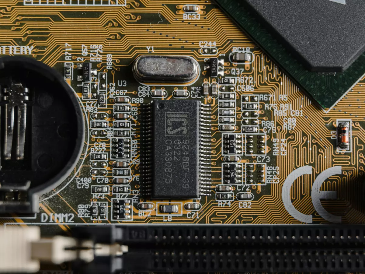 A close-up photo of an Intel processor chip on a motherboard.