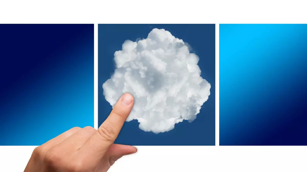 A hand pointing to a white cloud on a blue background. There are two other blue squares on either side of the cloud.