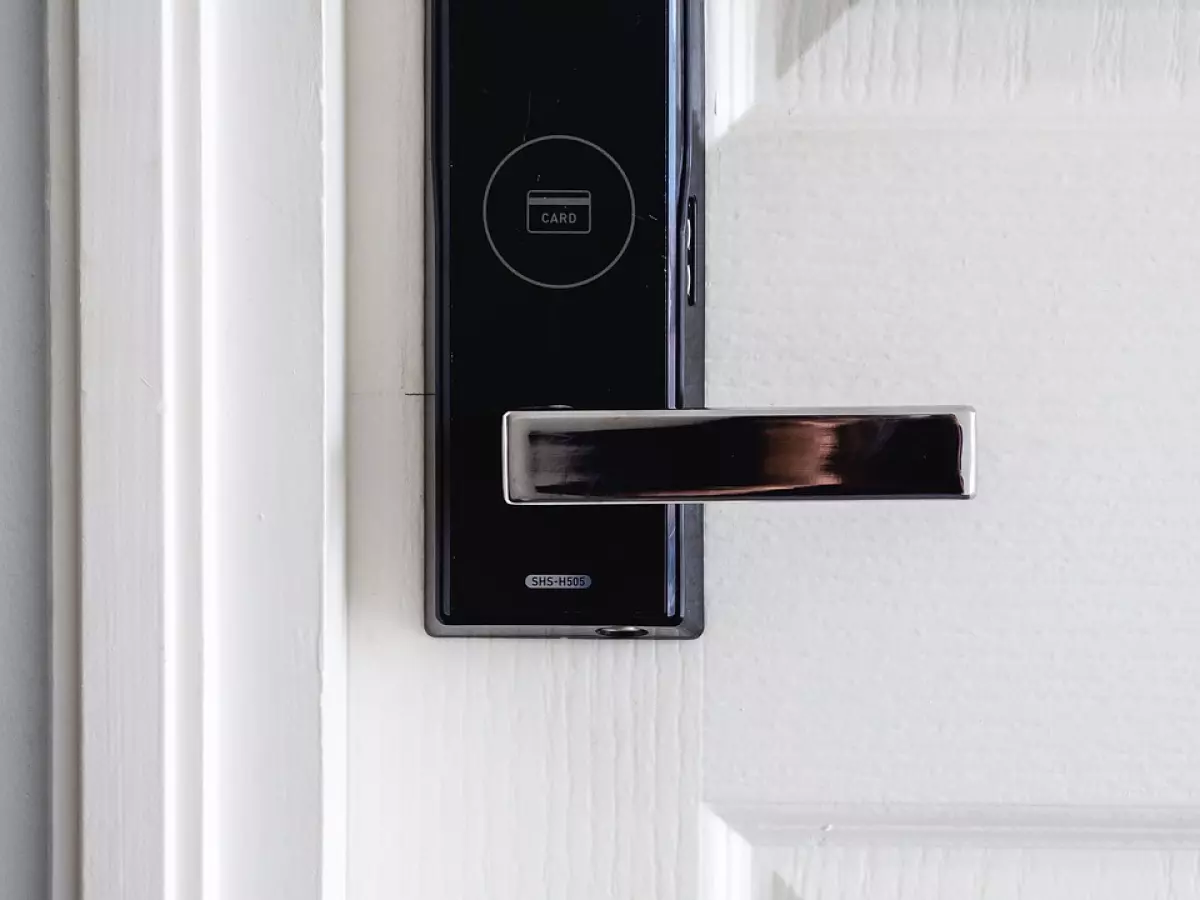 Close-up of a digital door lock with a card reader