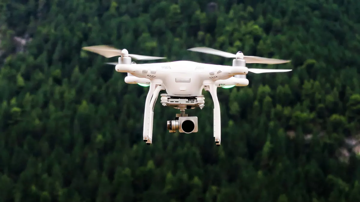 Drone flying over a forest