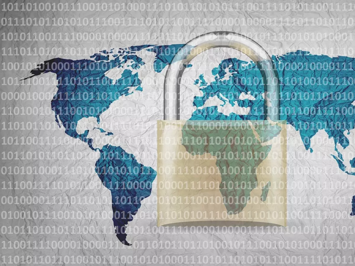 A padlock is superimposed on a world map, with binary code in the background.