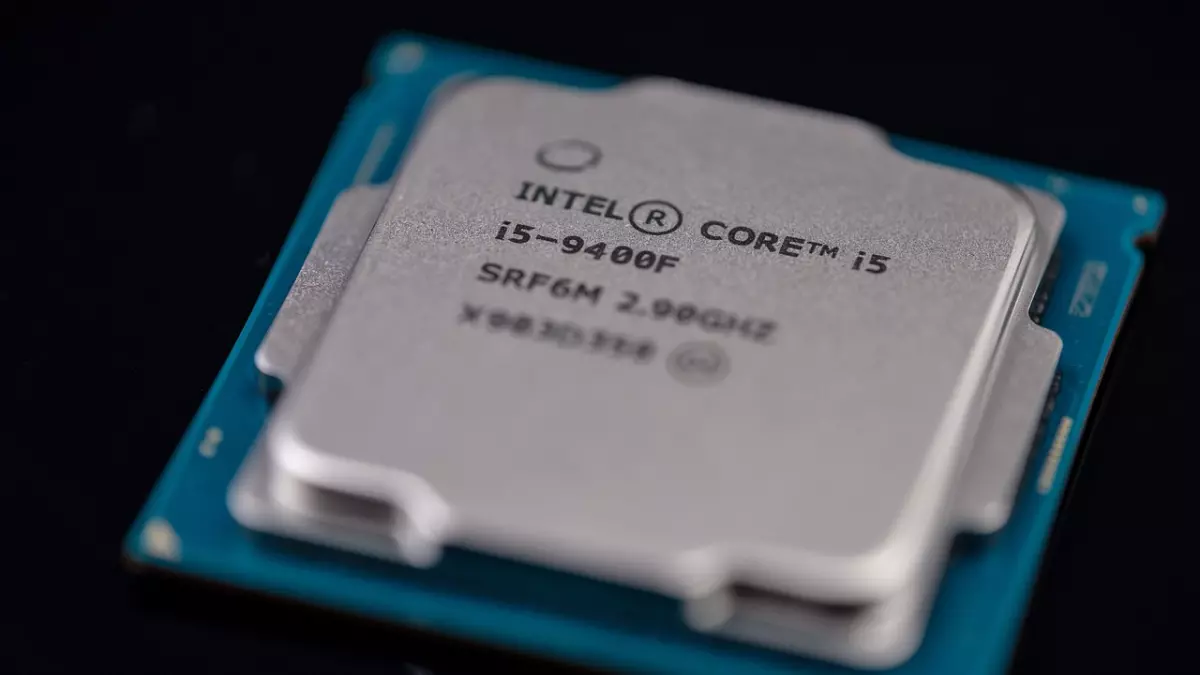 A close-up of an Intel CPU with the label "Intel Core i5-9400F" visible.