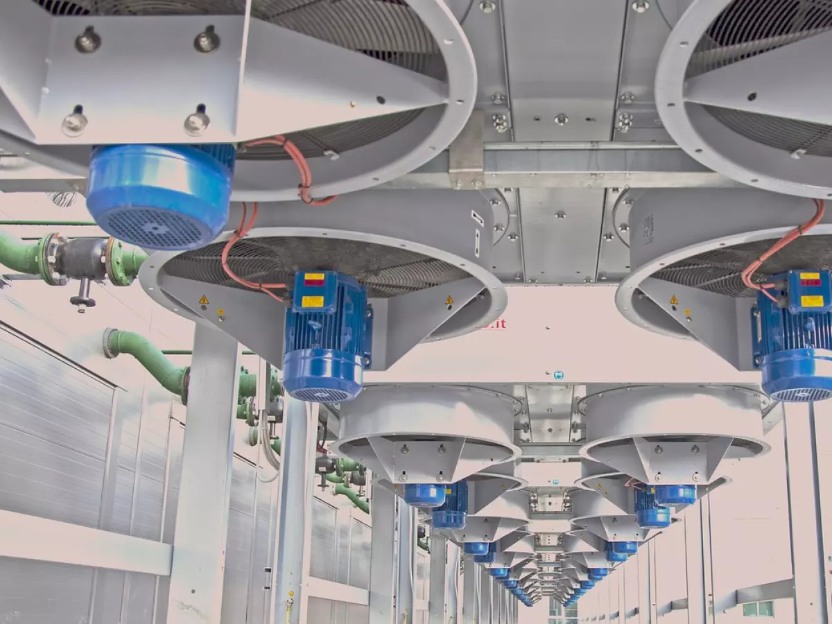 A row of large cooling fans in a data center. 