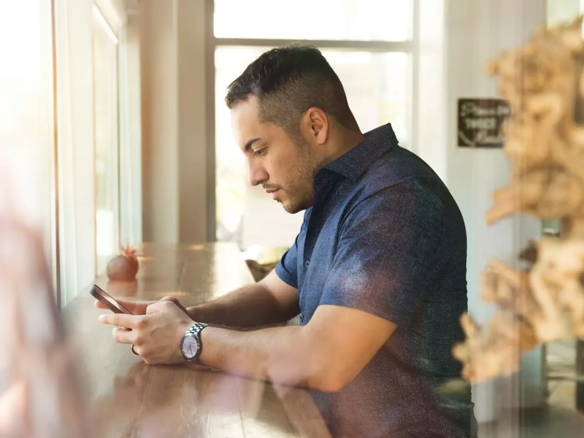 A man looking at his phone