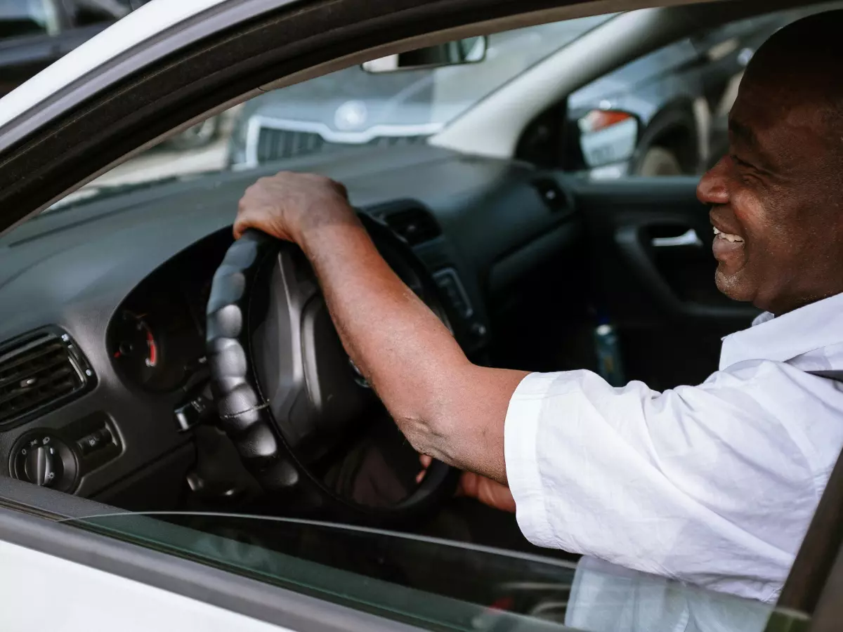 A man driving a car.