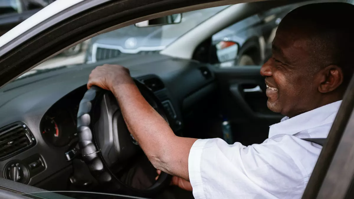 A man driving a car.