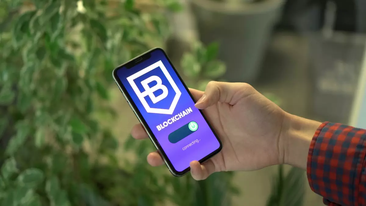 A person holding a smartphone with a blockchain app open, with the word 