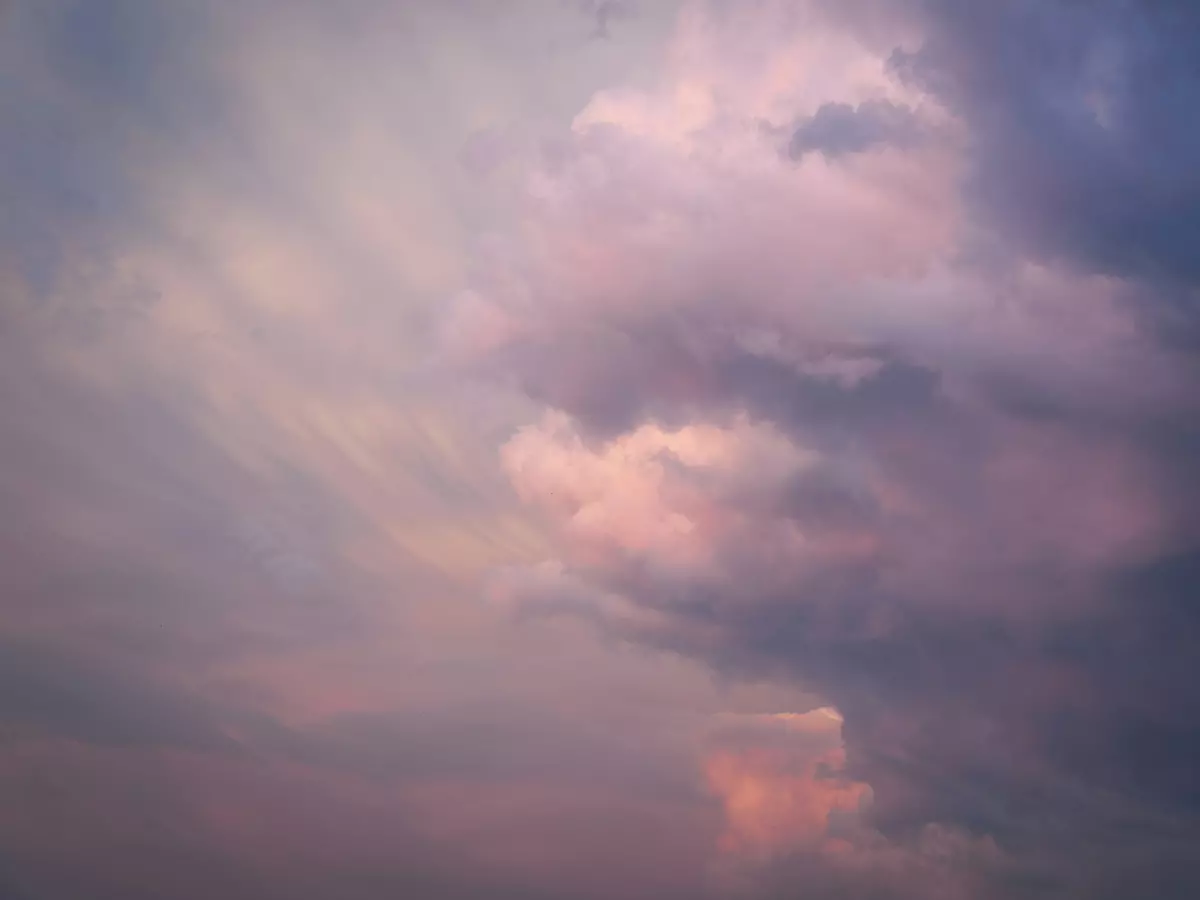 A beautiful sunset sky with pink and purple clouds.