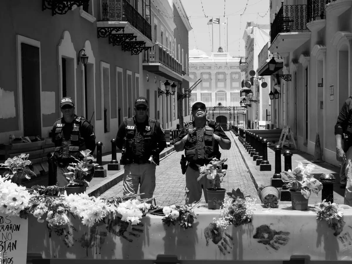 A police barricade with police officers on duty.