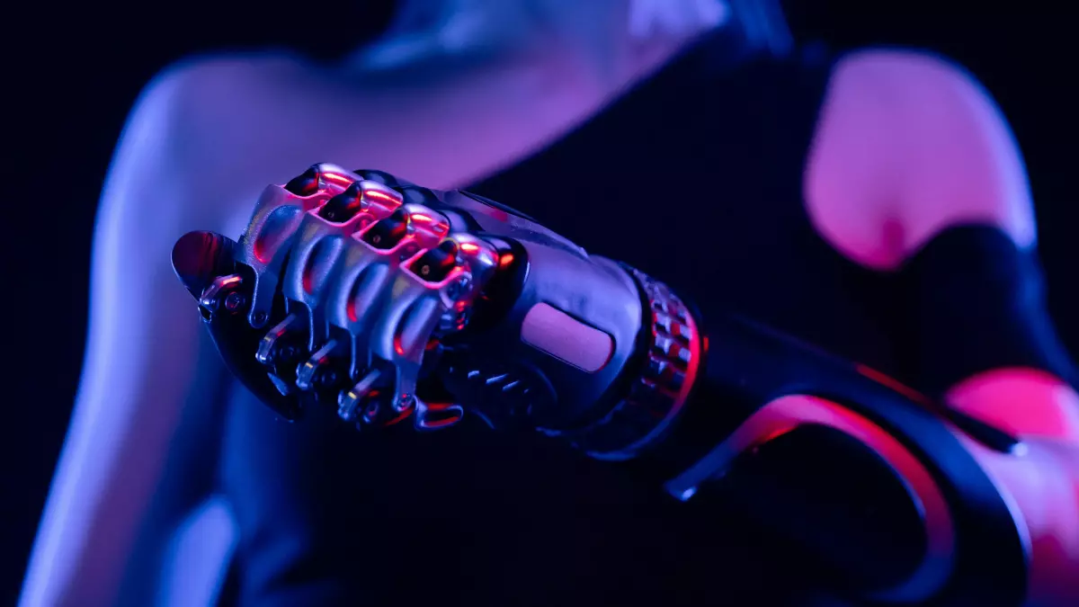 Close-up shot of a futuristic robotic arm or prosthetic, glowing with pink and blue neon light against a dark background.