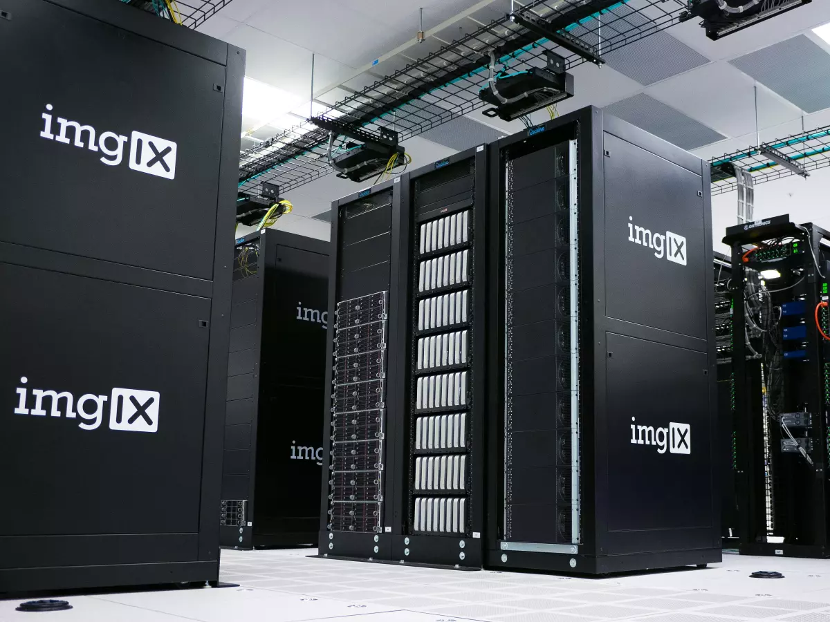 A server room with rows of servers, some with the label imgIX.