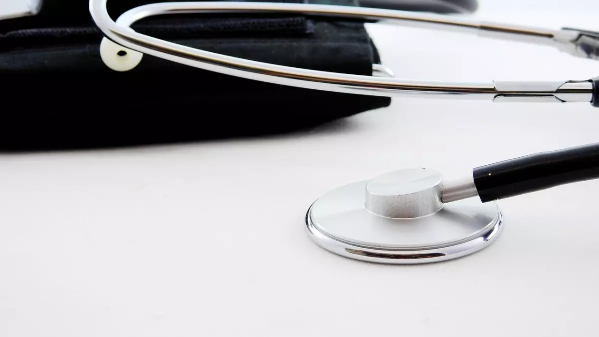 Stethoscope lying on white background