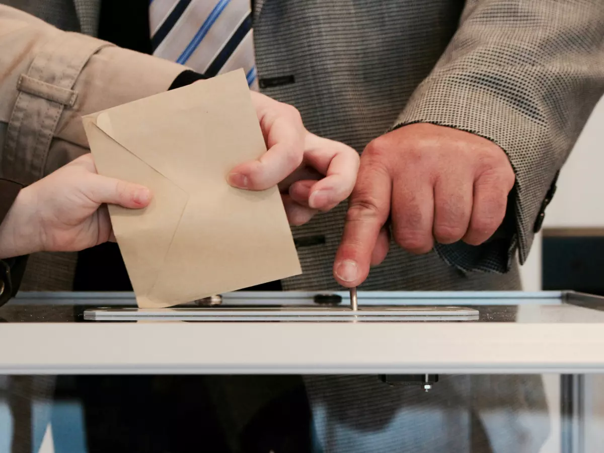 A person casting a vote in an election