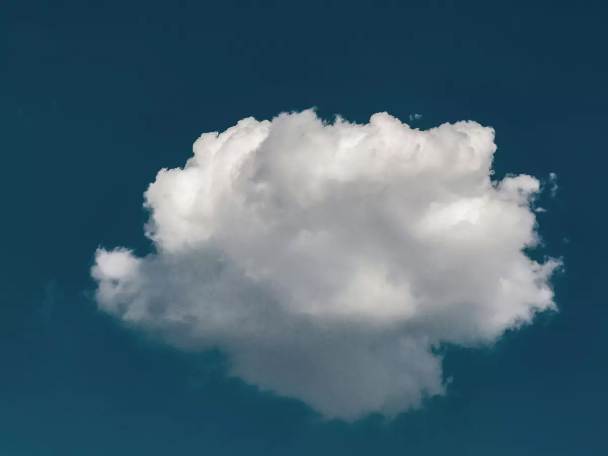 A white cloud against a blue sky.