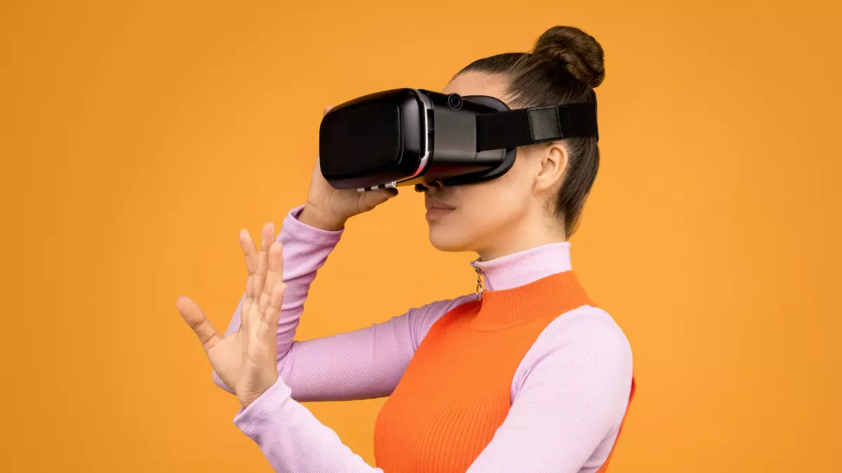 A person using a VR headset interacts with the digital world. 